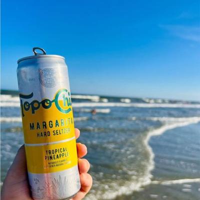 Topo Chico Tropical Pineapple Margarita Hard Seltzer: Interests include long sips on the beach.
📸: @marissadaqueen
